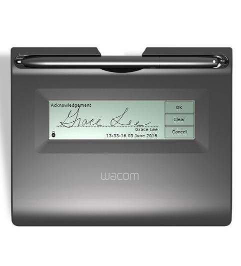 The Wacom STU 300B electronic signature pad being used to sign a document